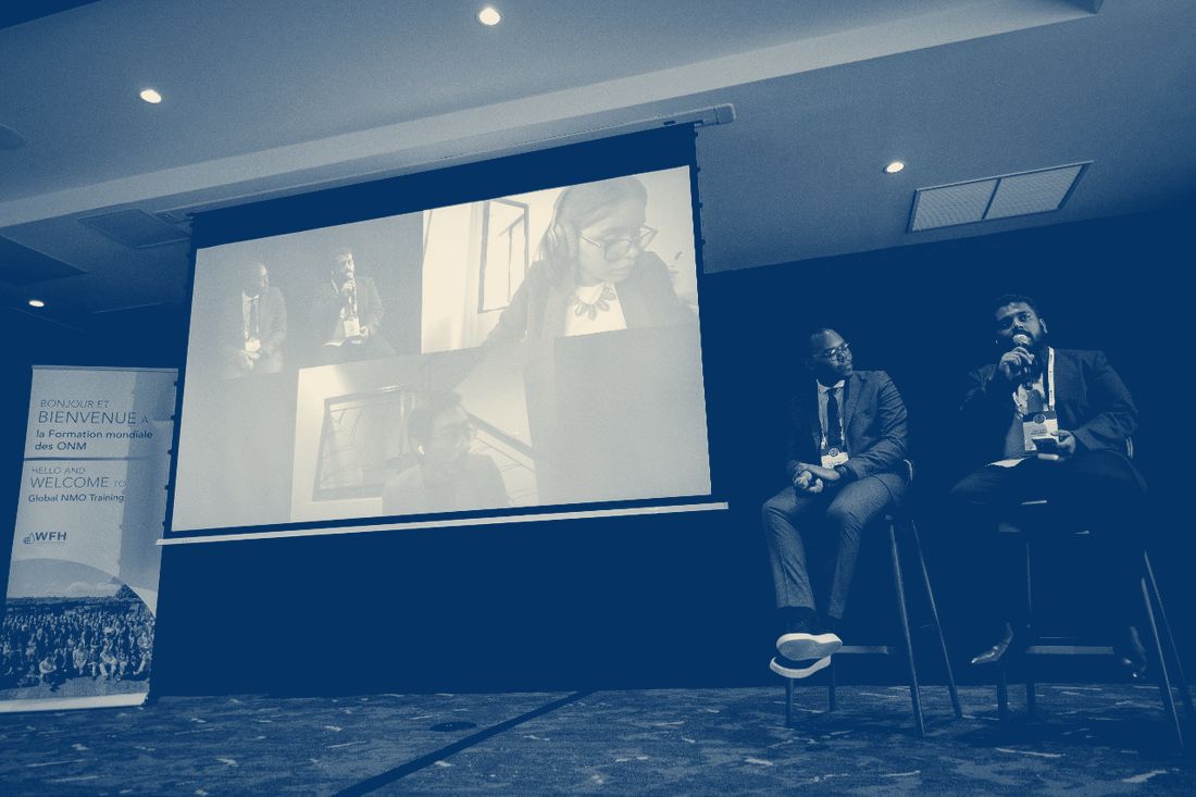 On the main stage in a panel discussion